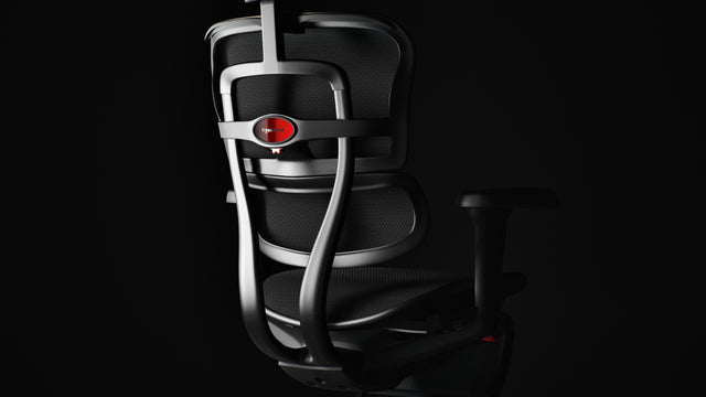 Rear view of the Ergohuman Ultra gaming chair in a black frame with black breathable mesh. Ergonomic gaming chair with free-float recline.