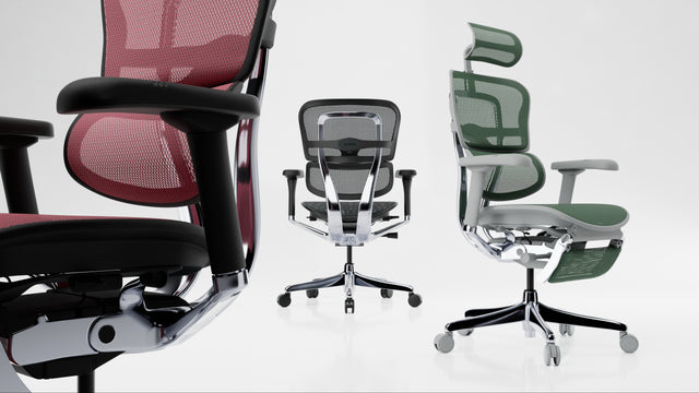 Three Ergohuman Elite office chairs, all facing different directions. The ergonomic office chairs are featured in a black frame with red mesh, black frame with black mesh, and a grey frame with green mesh. On the orthopedic chair are white spots which, when clicked, bring up in-depth details about the chairs' features.