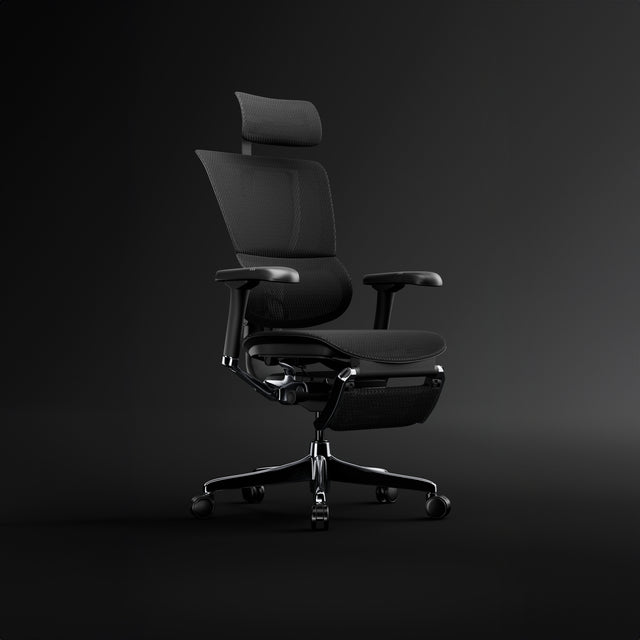 Black office chair with headrest and legrest - Mirus Elite G2 against a black background.