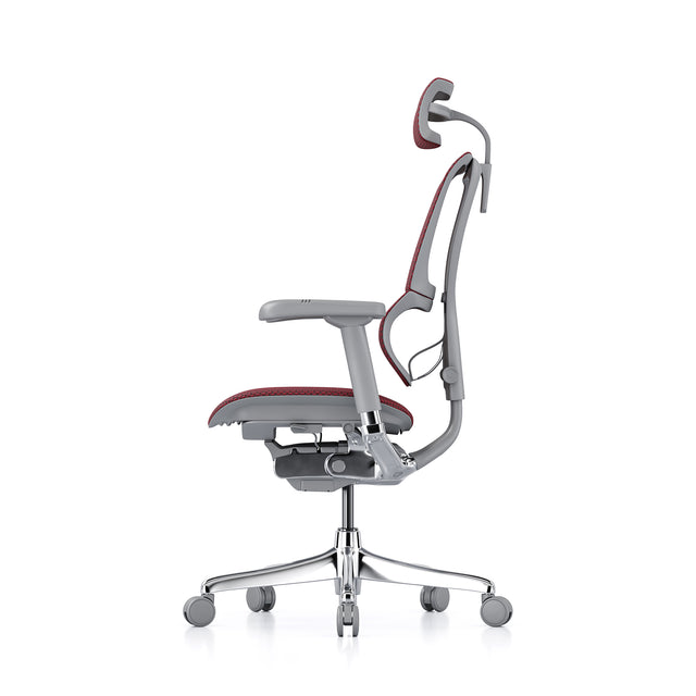left profile view of the mirus ergonomic office chair with headrest, grey frame red mesh